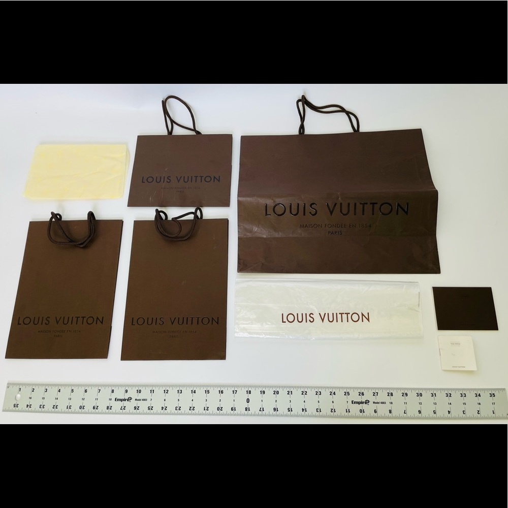 Set of Authentic Louis Vuitton shopping bags & packaging - 8 pieces